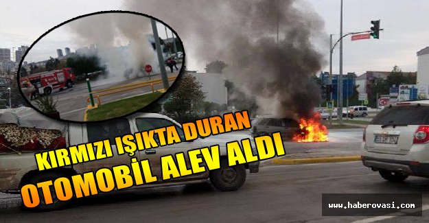 Kırmızı ışıkta duran otomobil alev aldı