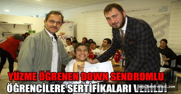 Yüzme öğrenen down sendromlu öğrencilere sertifikaları verildi