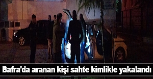 Bafra'da aranan kişi sahte kimlikle yakalandı